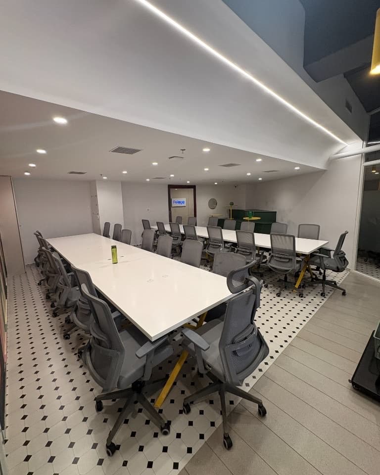 Secondary Corrivex meeting bay with long white tables set for collaborative training